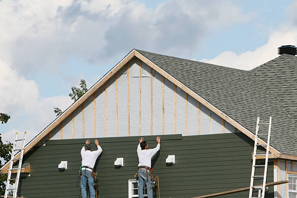 Professional Siding technician working in Schwenksville, PA
